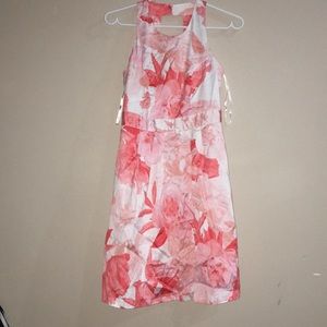 White sundress with red floral print